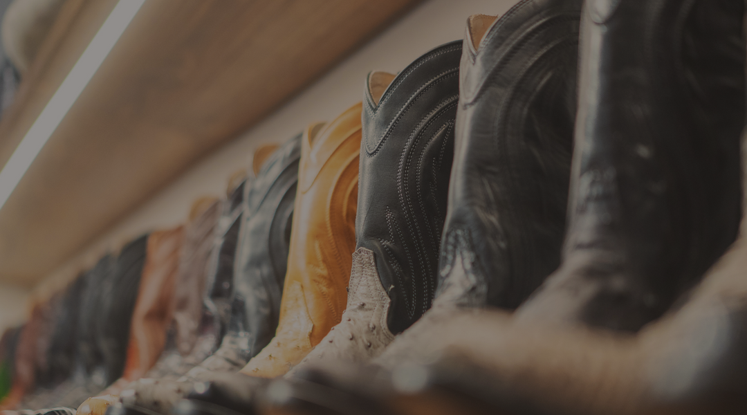 a Shelf full of boots, Rujo Boots Named Official Boot Partner of OK Wildcatters