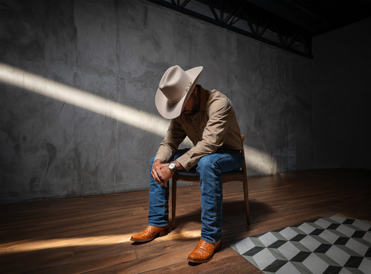 Cowboy wearing RUJO ostrich boots