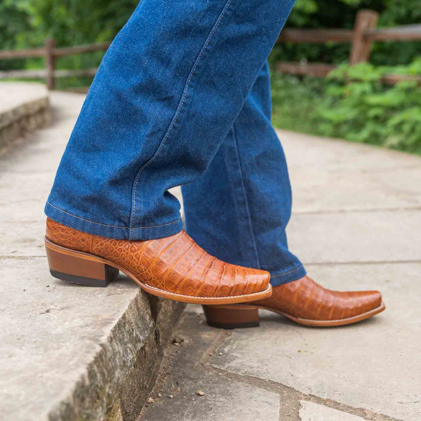 Close-up of a pair of Men's RUJO Caiman Cowboy Boots